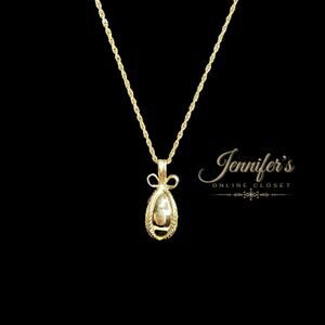 Joan Rivers Gold Tone Faberge Egg with Ribbon and Bow Detail Pendant Necklace